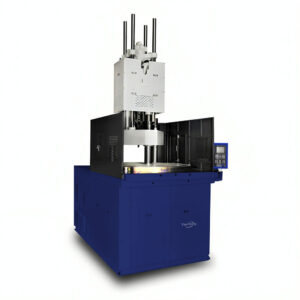 Máquina de moldeo por inyección vertical con mesa giratoria.